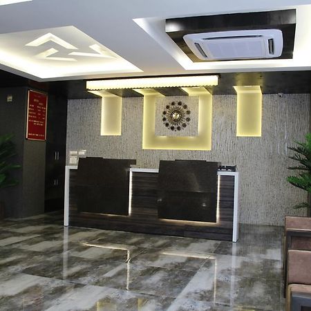 Treebo Unity Hotel Ahmedabad Bagian luar foto